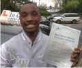  Aaron with Driving test pass certificate